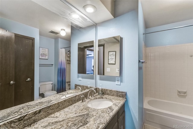 7394 S Field Ct, Littleton, CO 80128 - bathroom featuring vanity and shower / bath combo with shower curtain