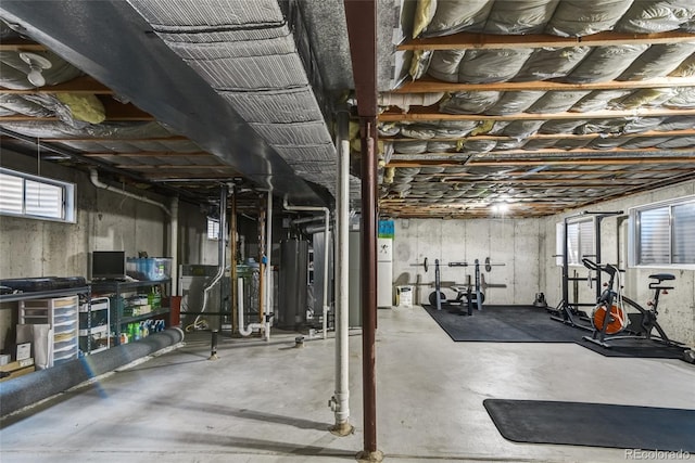 7394 S Field Ct, Littleton, CO 80128 - workout area featuring gas water heater and healthy amount of natural light