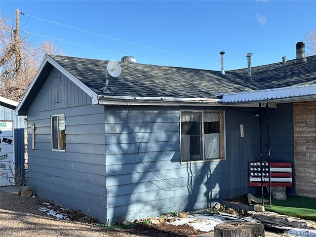 104 Tyranosaurus Trl, Dinosaur, CO 81610 - view of property exterior featuring a shingled roof