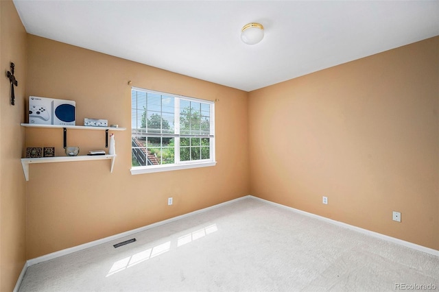 5774 S Genoa Ct, Aurora, CO 80015 - carpeted spare room with baseboards