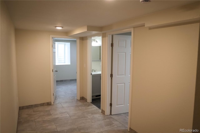 1511 E Routt St Ave, Pueblo, CO 81004 - interior space featuring baseboards and a sink