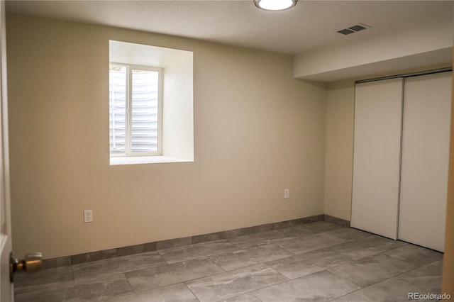 1511 E Routt St Ave, Pueblo, CO 81004 - unfurnished bedroom featuring a closet, baseboards, and visible vents