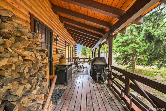 1673 Sinton Rd, Evergreen, CO 80439 - wooden terrace featuring area for grilling