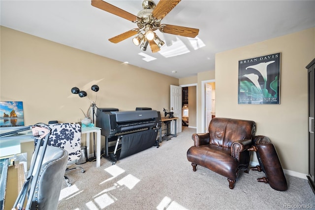 interior space with light colored carpet and ceiling fan