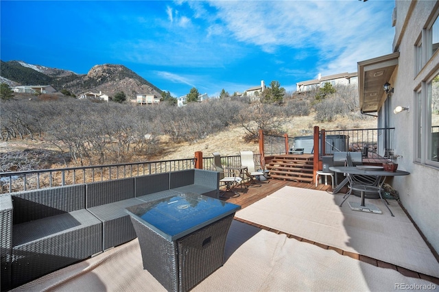 3325 Blodgett, Colorado Springs, CO 80919 - view of patio featuring an outdoor living space and a deck with mountain view