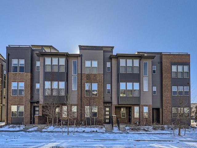 view of snow covered property