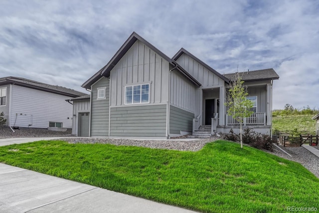 788 Alumroot St, Castle Rock, CO 80104 - single story home with board and batten siding, a front yard, a garage, and driveway