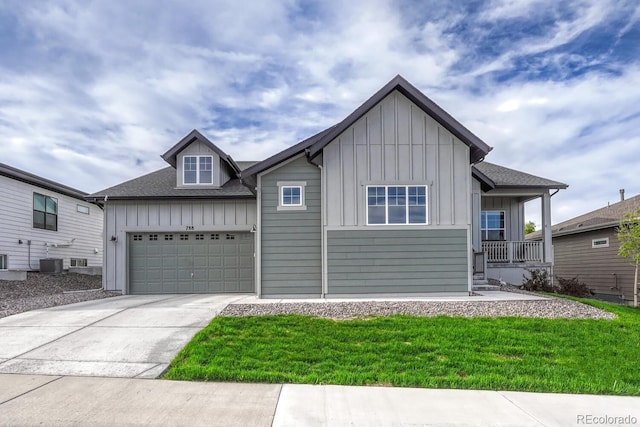 788 Alumroot St, Castle Rock, CO 80104 - ranch-style house featuring board and batten siding, a front lawn, an attached garage, driveway, and a shingled roof