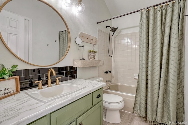 458 Rolling Hills Dr, Colorado Springs, CO 80919 - bathroom featuring decorative backsplash, vanity, shower / bath combination with curtain, and wood finished floors