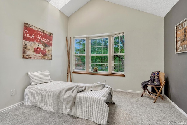458 Rolling Hills Dr, Colorado Springs, CO 80919 - carpeted bedroom featuring vaulted ceiling and a skylight