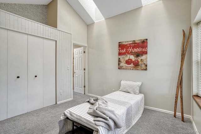 458 Rolling Hills Dr, Colorado Springs, CO 80919 - bedroom featuring carpet flooring, a closet, and lofted ceiling