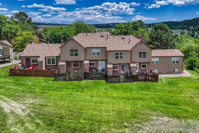 458 Rolling Hills Dr, Colorado Springs, CO 80919 - rear view of house with a lawn, a chimney, and a patio