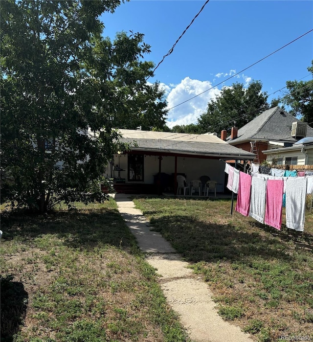 exterior space with a yard