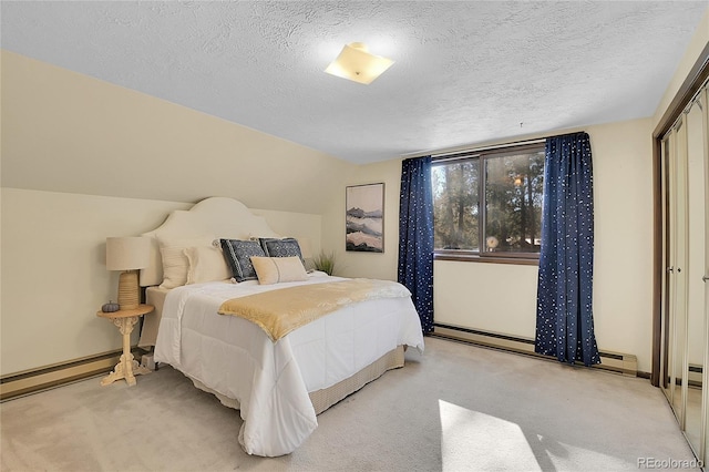 carpeted bedroom with lofted ceiling, a baseboard radiator, and a textured ceiling