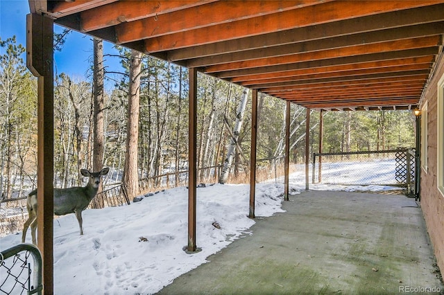 view of snow covered patio