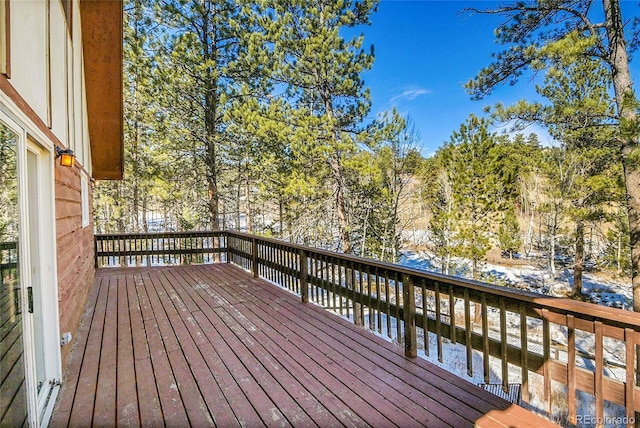 view of snow covered deck