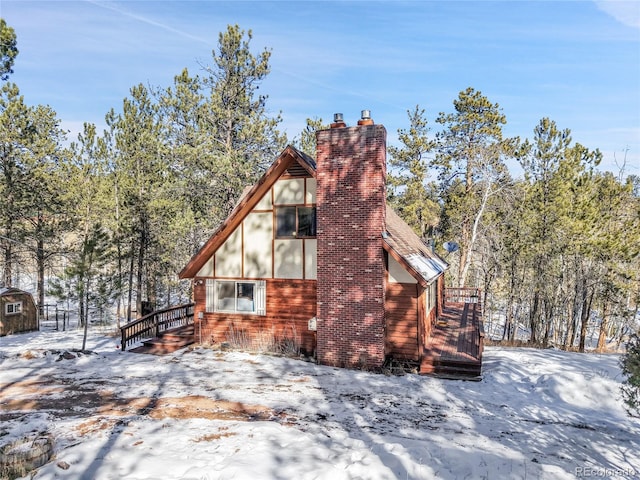 view of snow covered property