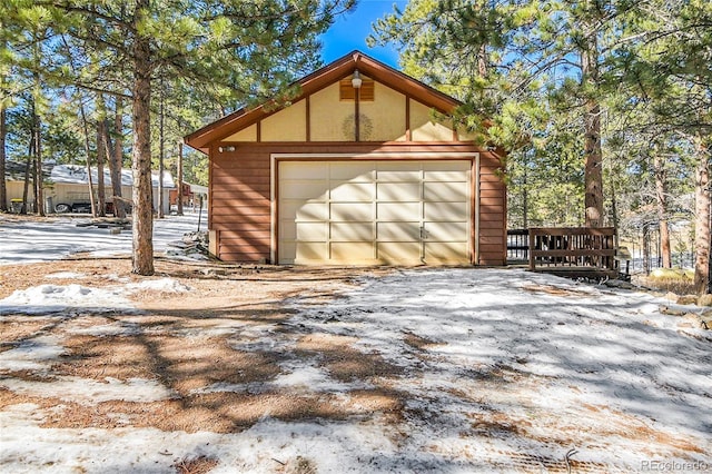 view of snow covered garage