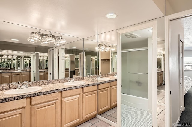 full bath featuring vanity, visible vents, recessed lighting, bath / shower combo with glass door, and tile patterned floors