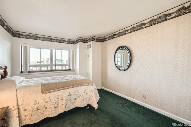 bedroom with wallpapered walls, carpet, visible vents, and baseboards