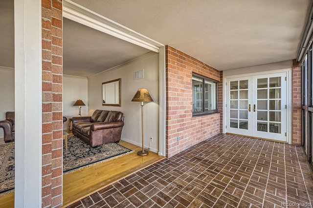 exterior space featuring french doors and visible vents