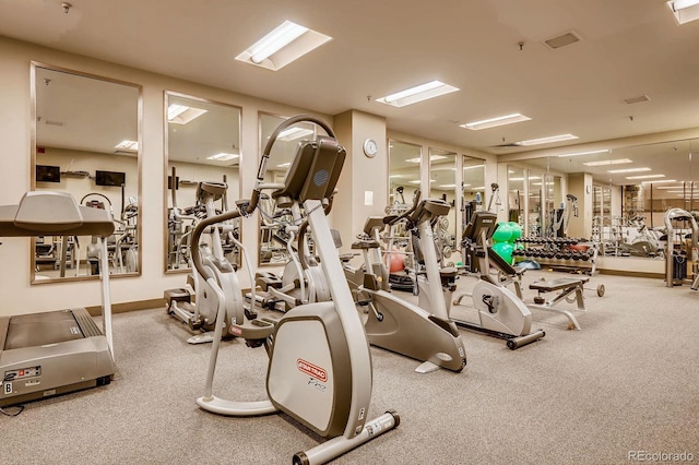 exercise room with baseboards