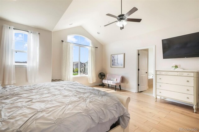 10525 Mt Sherman Way, Peyton, CO 80831 - bedroom featuring lofted ceiling, light wood-style flooring, ensuite bathroom, a ceiling fan, and baseboards