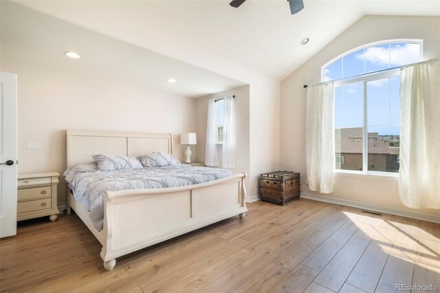 10525 Mt Sherman Way, Peyton, CO 80831 - bedroom featuring light wood finished floors, lofted ceiling, recessed lighting, a ceiling fan, and baseboards