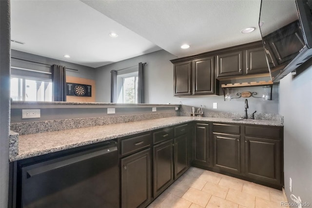10525 Mt Sherman Way, Peyton, CO 80831 - kitchen featuring recessed lighting, light tile patterned flooring, light stone counters, a sink, and open shelves