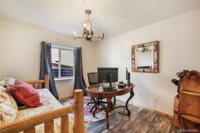 10525 Mt Sherman Way, Peyton, CO 80831 - office area with a chandelier, wood finished floors, and baseboards
