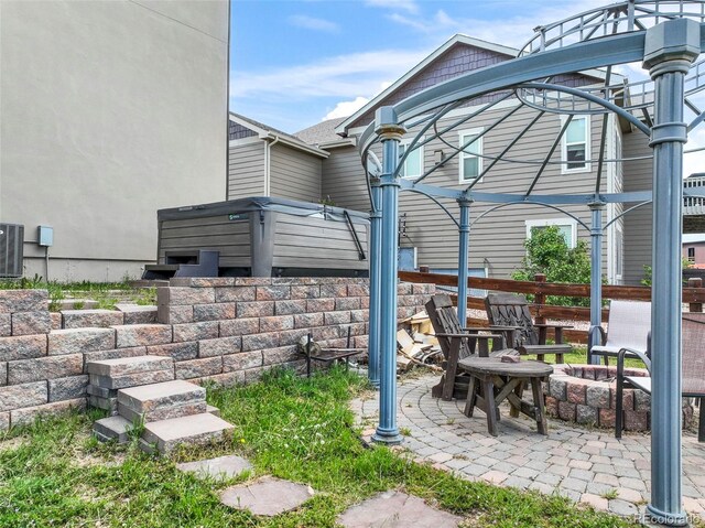 10525 Mt Sherman Way, Peyton, CO 80831 - view of patio featuring a fire pit