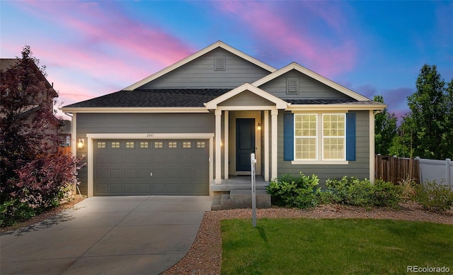 2043 S Cathay Way, Aurora, CO 80013 - ranch-style house with driveway, a garage, and roof with shingles