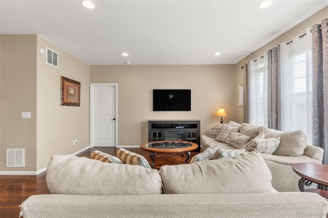 2043 S Cathay Way, Aurora, CO 80013 - living area with dark wood finished floors and recessed lighting