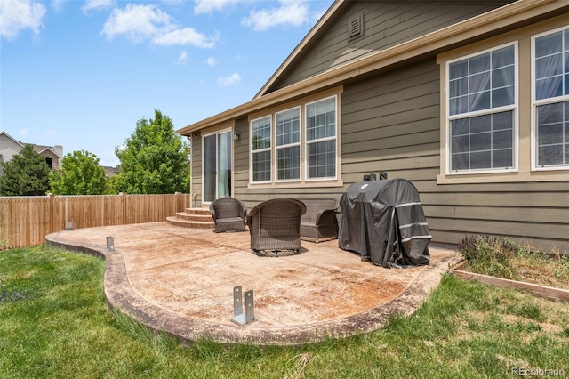 2043 S Cathay Way, Aurora, CO 80013 - view of patio featuring entry steps and a grill
