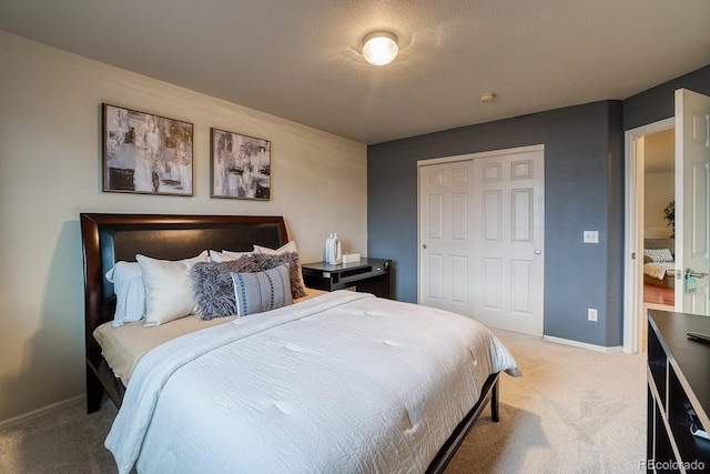 3779 Aspen Hollow Ct, Castle Rock, CO 80104 - bedroom featuring light colored carpet, baseboards, and a closet