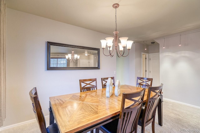 3779 Aspen Hollow Ct, Castle Rock, CO 80104 - dining area with a chandelier, carpet flooring, and baseboards