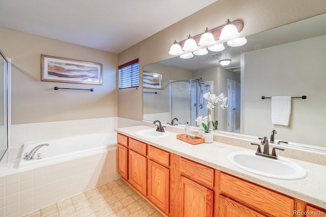 3779 Aspen Hollow Ct, Castle Rock, CO 80104 - full bathroom featuring a shower stall, a garden tub, double vanity, and tile patterned flooring