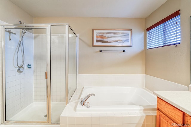 3779 Aspen Hollow Ct, Castle Rock, CO 80104 - bathroom featuring a garden tub, a stall shower, and vanity