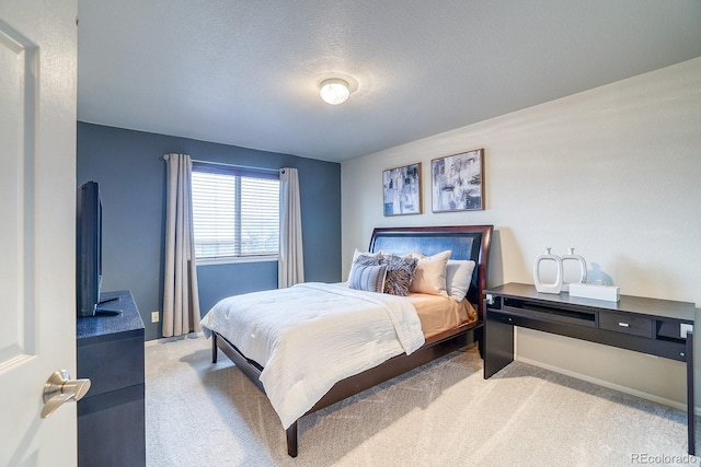 3779 Aspen Hollow Ct, Castle Rock, CO 80104 - carpeted bedroom with a textured ceiling and baseboards