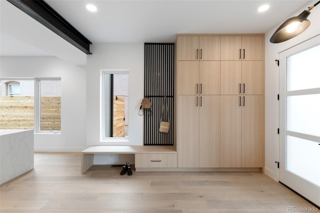 mudroom featuring light wood-style floors and recessed lighting