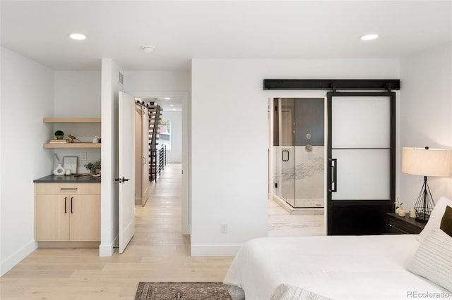 bedroom with recessed lighting, baseboards, visible vents, and light wood finished floors