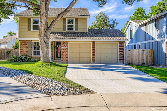 8156 Carr Cir, Arvada, CO 80005 - traditional-style home with brick siding, concrete driveway, roof with shingles, and an attached garage