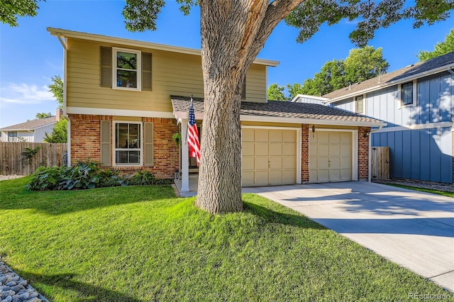 8156 Carr Cir, Arvada, CO 80005 - view of front of home featuring brick siding, concrete driveway, and an attached garage