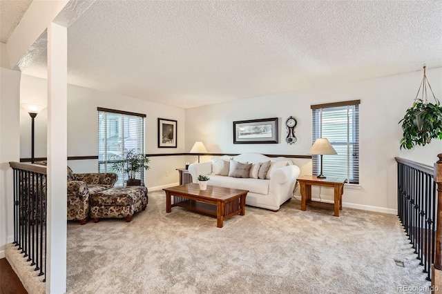8156 Carr Cir, Arvada, CO 80005 - living room featuring a textured ceiling and carpet