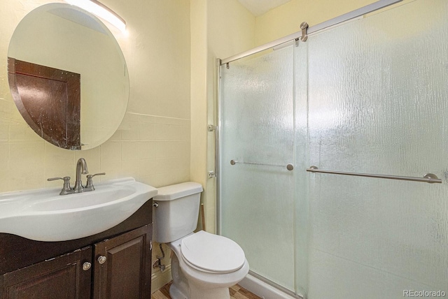 3159 36th Ave, Denver, CO 80211 - full bathroom with a shower stall, toilet, and vanity