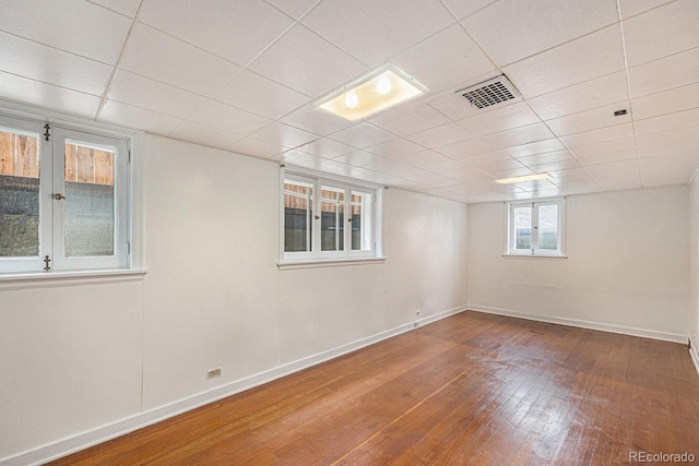 3159 36th Ave, Denver, CO 80211 - below grade area with wood-type flooring, baseboards, and visible vents