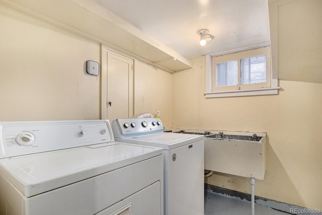 3159 36th Ave, Denver, CO 80211 - clothes washing area with washer and dryer, a sink, and laundry area