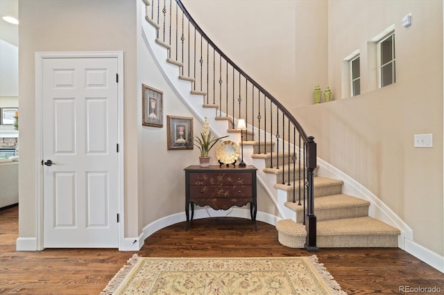 17452 W 83rd Pl, Arvada, CO 80007 - stairway with wood finished floors and baseboards