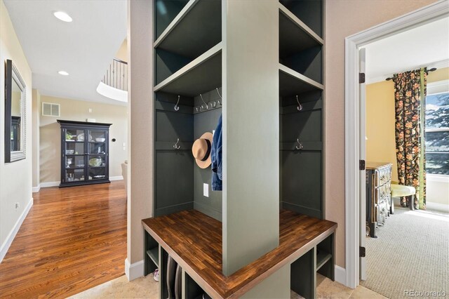 17452 W 83rd Pl, Arvada, CO 80007 - mudroom with wood finished floors, baseboards, and recessed lighting