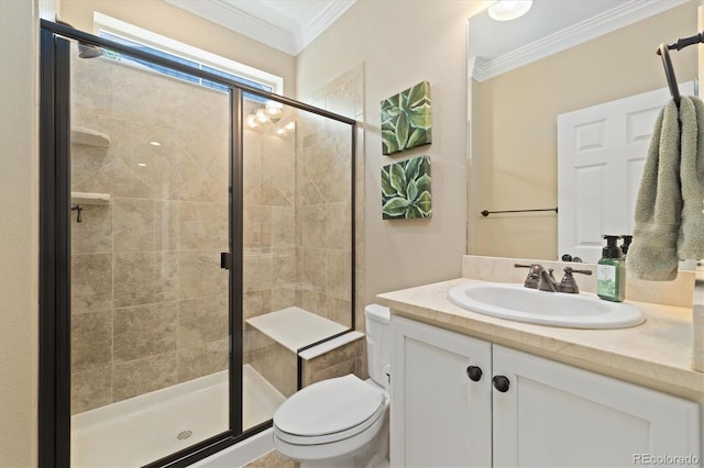 17452 W 83rd Pl, Arvada, CO 80007 - bathroom with crown molding, a shower stall, toilet, and vanity